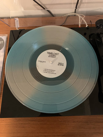 Timelost : Gushing Interest (12", Ltd, Blu)