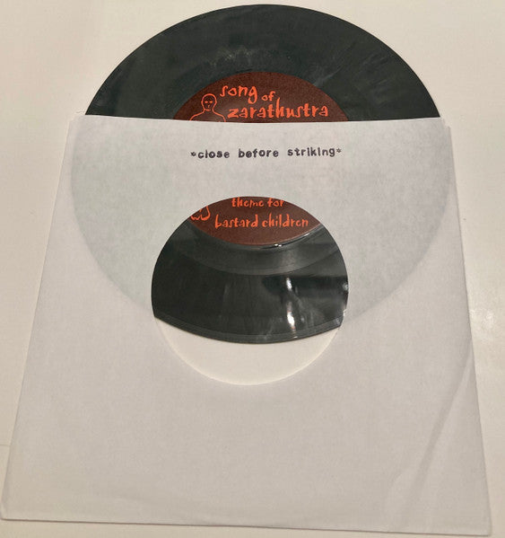 Spread The Disease / Song Of Zarathustra : Song Of Zarathustra Vs. Spread The Disease (7", EP, Ltd, Gre)