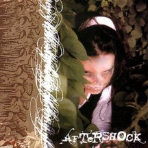 Aftershock (6) : Through The Looking Glass (CD, Album)