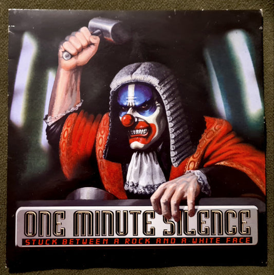One Minute Silence : Stuck Between A Rock And A White Face  (7", Single)
