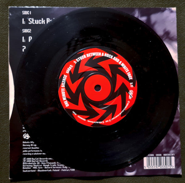 One Minute Silence : Stuck Between A Rock And A White Face  (7", Single)
