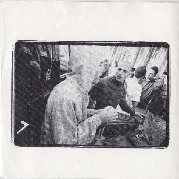 Shelter (2) : In Defense Of Reality / The News (7")