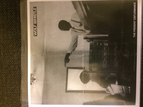 Wolf Whistle : The Present Disturbance (7", EP, Ltd)